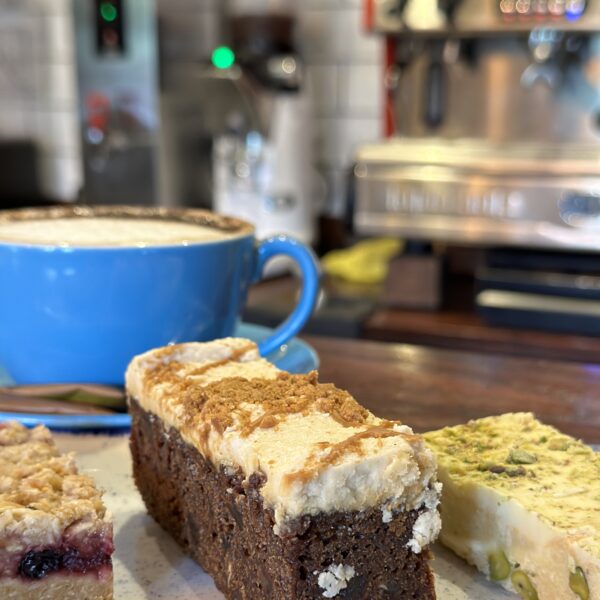Cakes on a plate with coffee