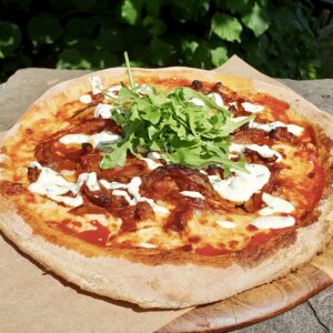 WH pizza outside in the sun